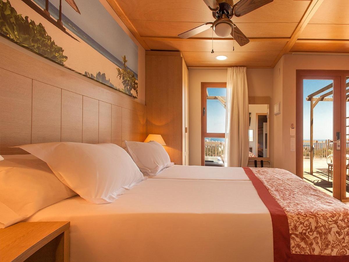 Cama o camas de una habitación en Magic Natura Resort