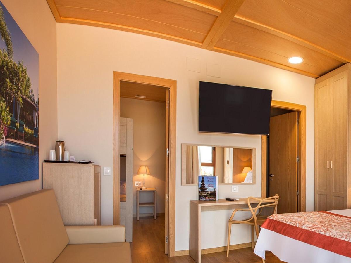 Cama o camas de una habitación en Magic Natura Resort