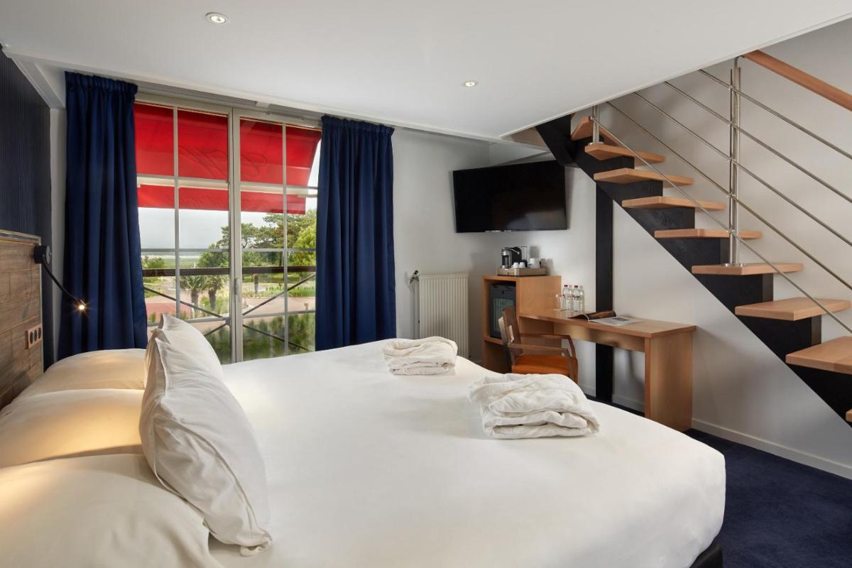 Un ou plusieurs lits dans un hébergement de l'établissement Le Grand Hôtel Le Touquet-Paris-Plage