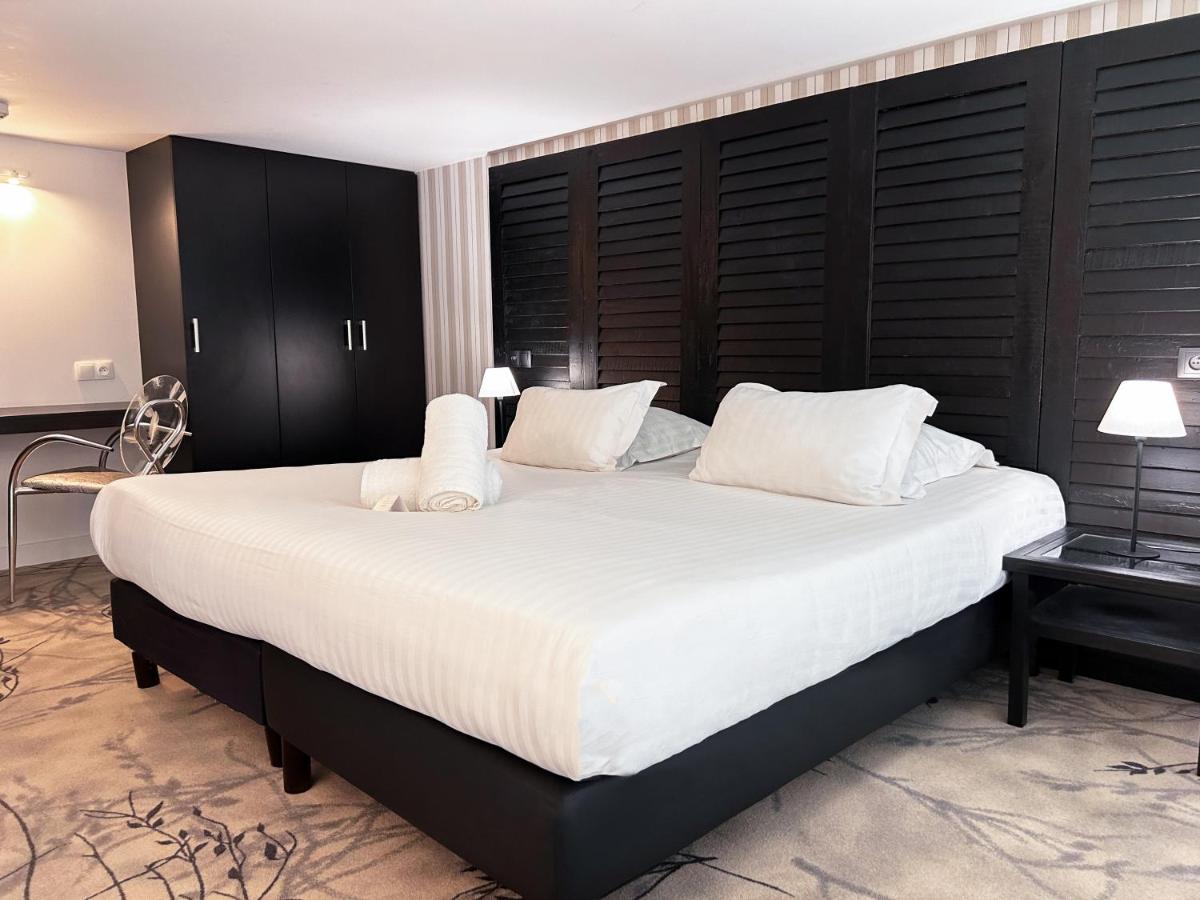 Un ou plusieurs lits dans un hébergement de l'établissement Le Grand Hôtel Le Touquet-Paris-Plage