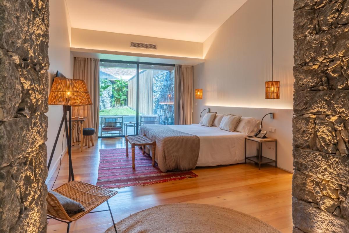 Uma cama ou camas num quarto em SENSI Azores Nature and SPA