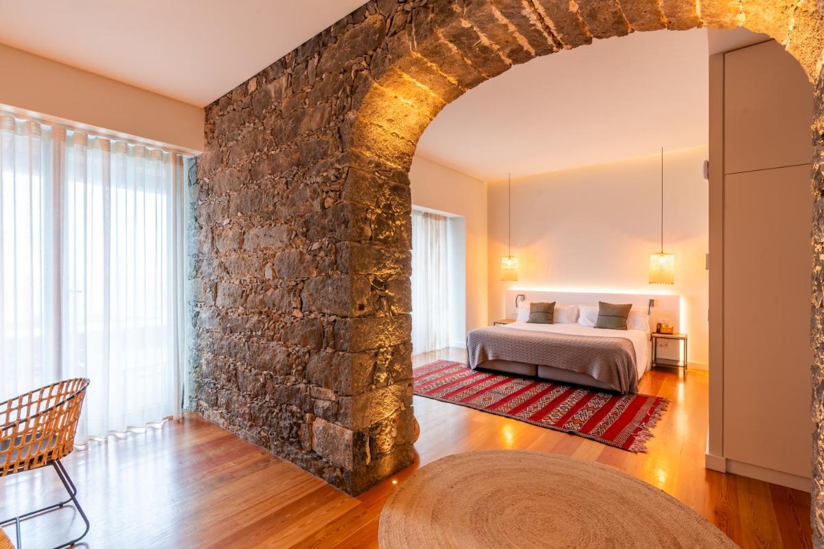 Uma cama ou camas num quarto em SENSI Azores Nature and SPA