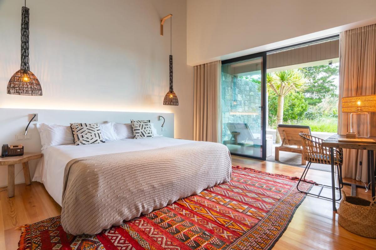 Uma cama ou camas num quarto em SENSI Azores Nature and SPA