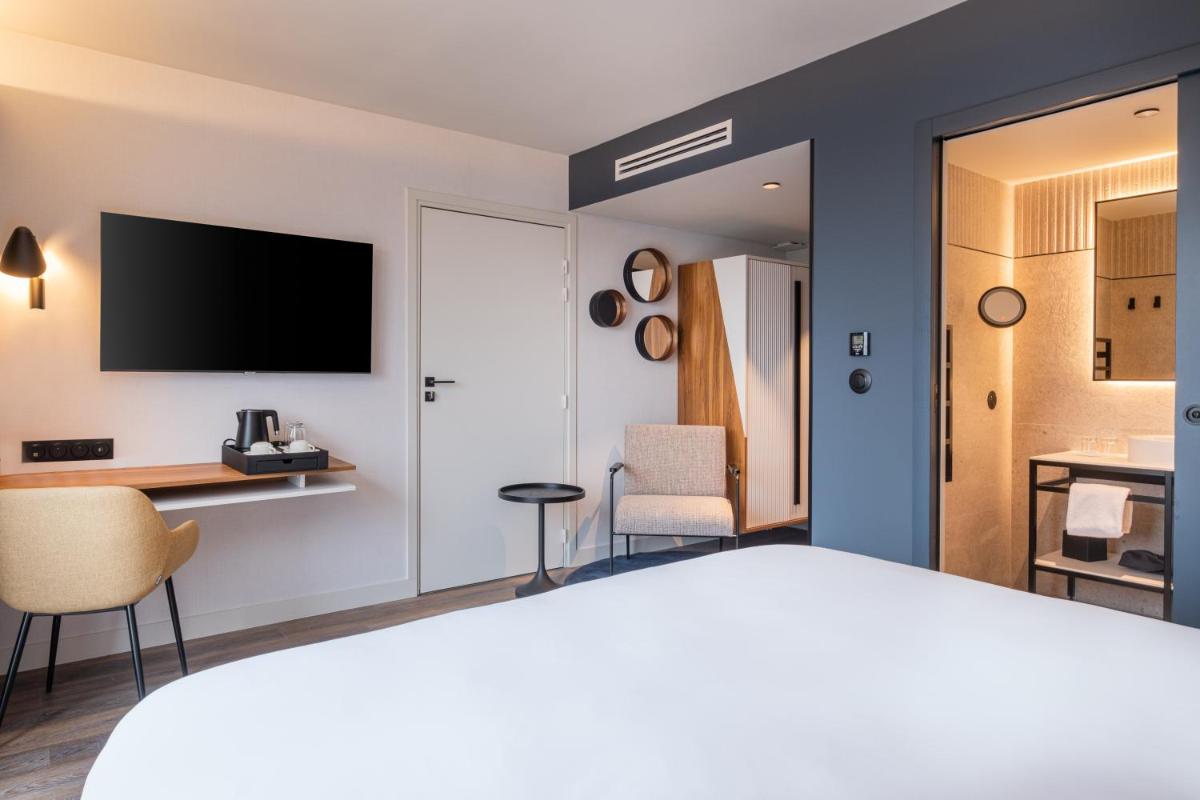 Un ou plusieurs lits dans un hébergement de l'établissement Radisson Blu Grand Hotel & Spa, Malo-Les-Bains