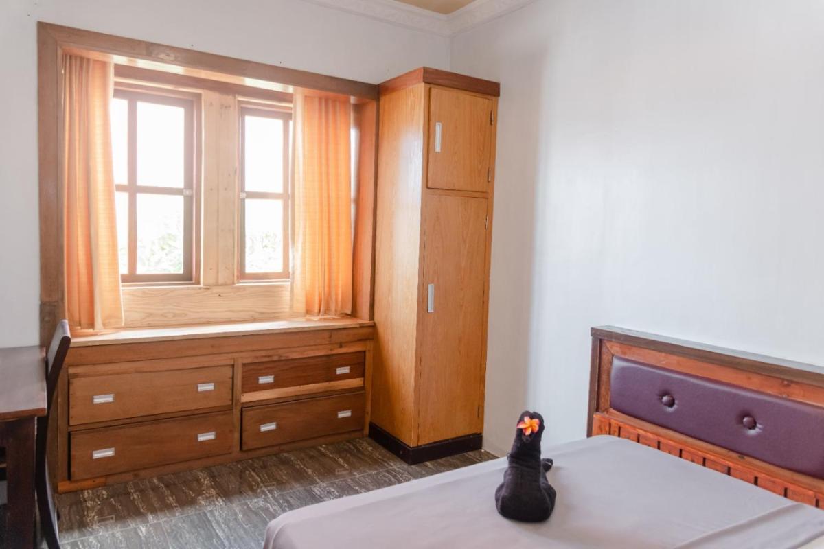 Pigeon Mandala Apartments & Resto - Housity