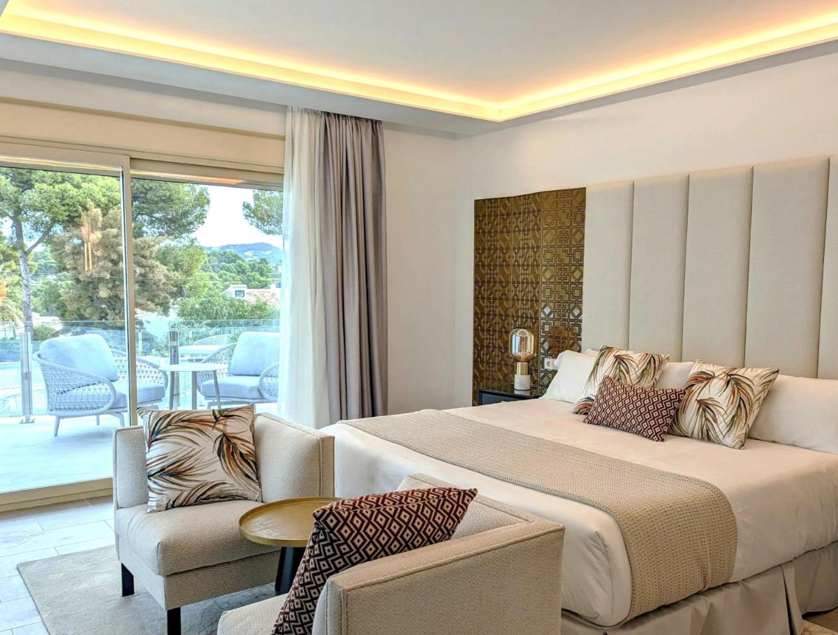 Cama o camas de una habitación en Dionis Boutique Hotel & Spa