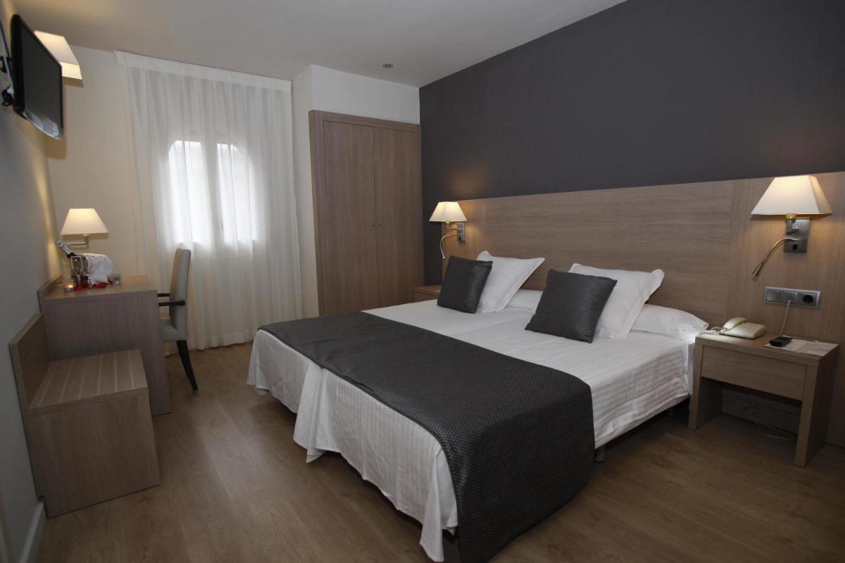 Cama o camas de una habitación en Balneari Termes Victòria