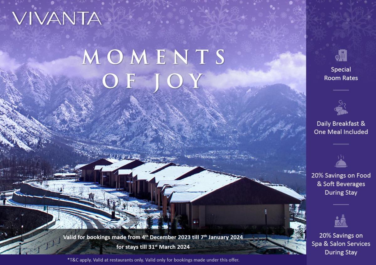 a flyer for a mountain resort with snow covered mountains at Vivanta Hyderabad, Begumpet in Hyderabad a flyer for a mountain resort with snow covered mountains at Vivanta Hyderabad, Begumpet in Hyderabad