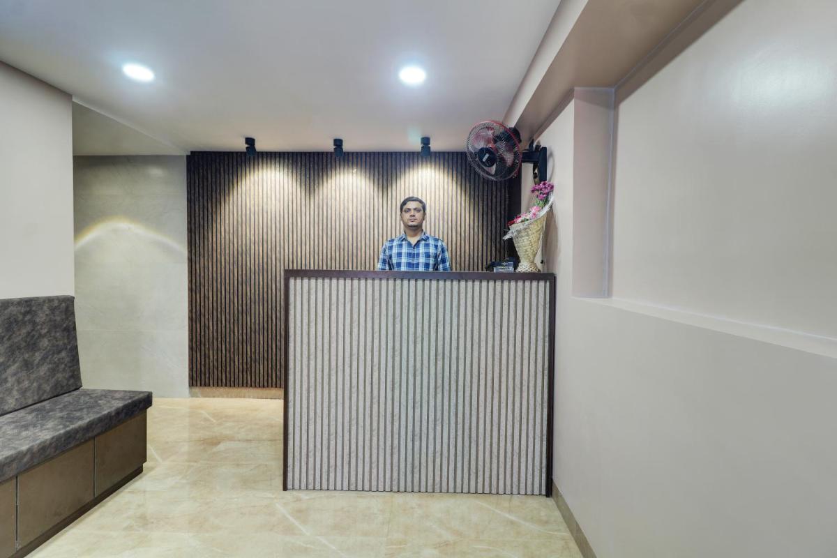 Hotel Embrace Inn Near Exhibition Center - Housity