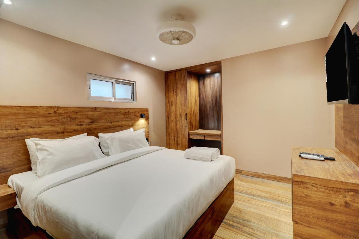 Hotel Embrace Inn Near Exhibition Center - Housity