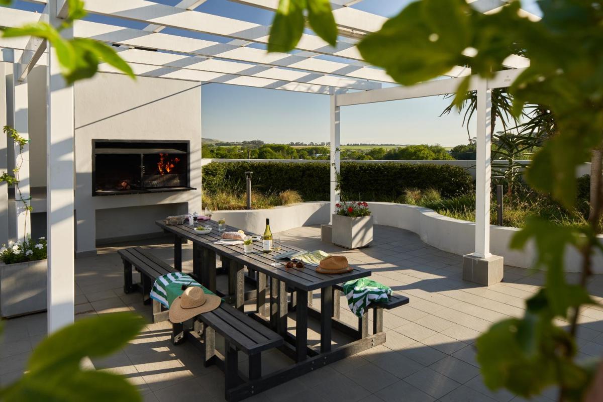 The Den Apartments by Raw Africa Collection - Housity