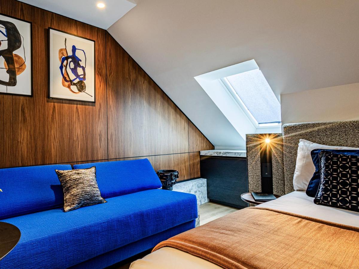 Un ou plusieurs lits dans un hébergement de l'établissement Grand Hôtel La Cloche Dijon - MGallery Collection