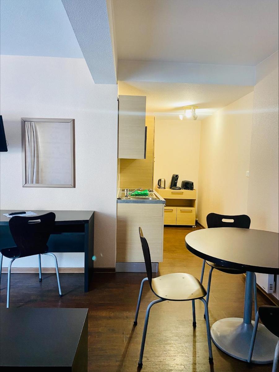 Cuisine ou kitchenette dans l'établissement Résidence Le Grand Tétras- SPA THERMAL INCLUS