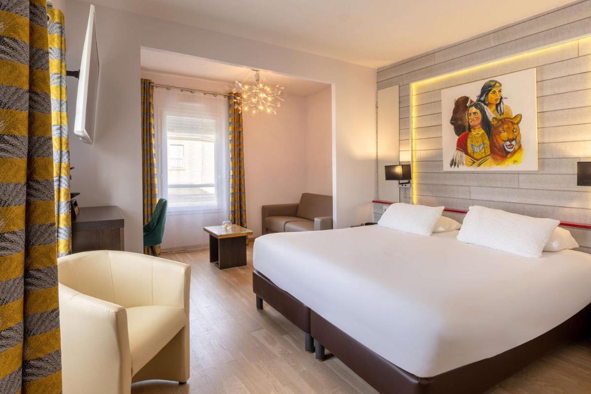Un ou plusieurs lits dans un hébergement de l'établissement Best Western Hotel & SPA Pau Lescar Aeroport