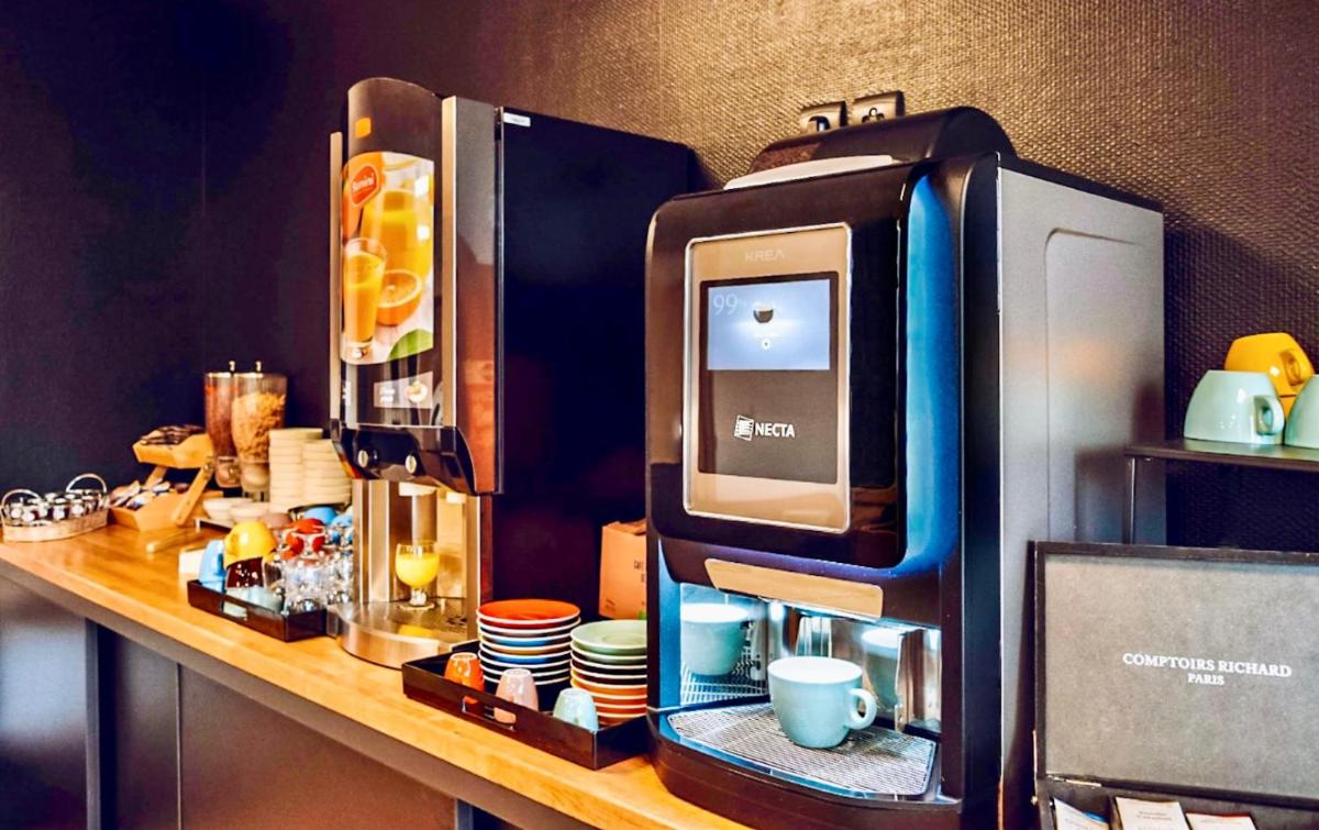 Cuisine ou kitchenette dans l'établissement Tulip Inn Honfleur Residence & Spa