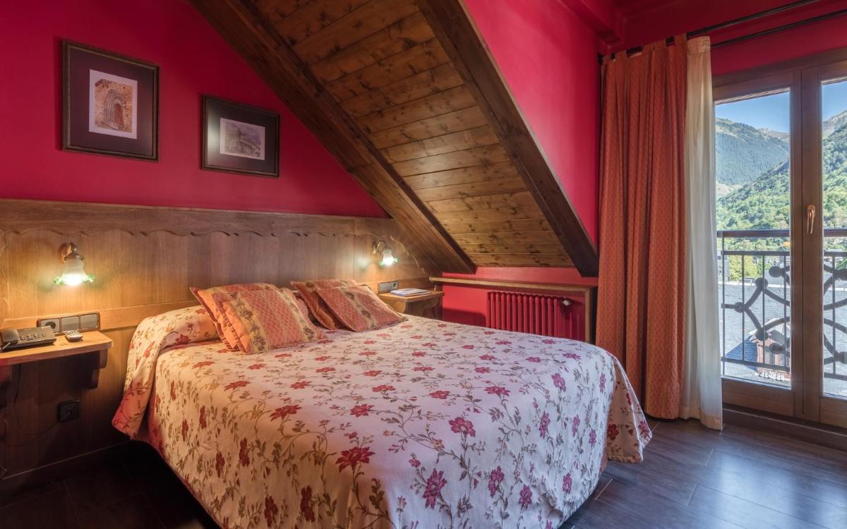 Cama o camas de una habitación en Hotel Aran La Abuela