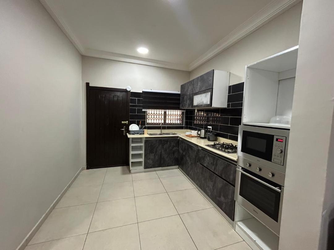 Ghana City Luxe 3 beds & 5 baths House with backup Solar Power - Housity