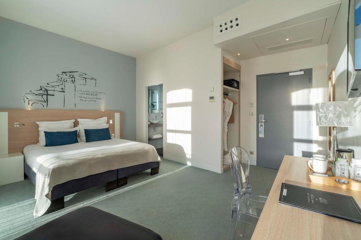 Un ou plusieurs lits dans un hébergement de l'établissement Best Western Plus Villa Saint Antoine Hotel & Spa