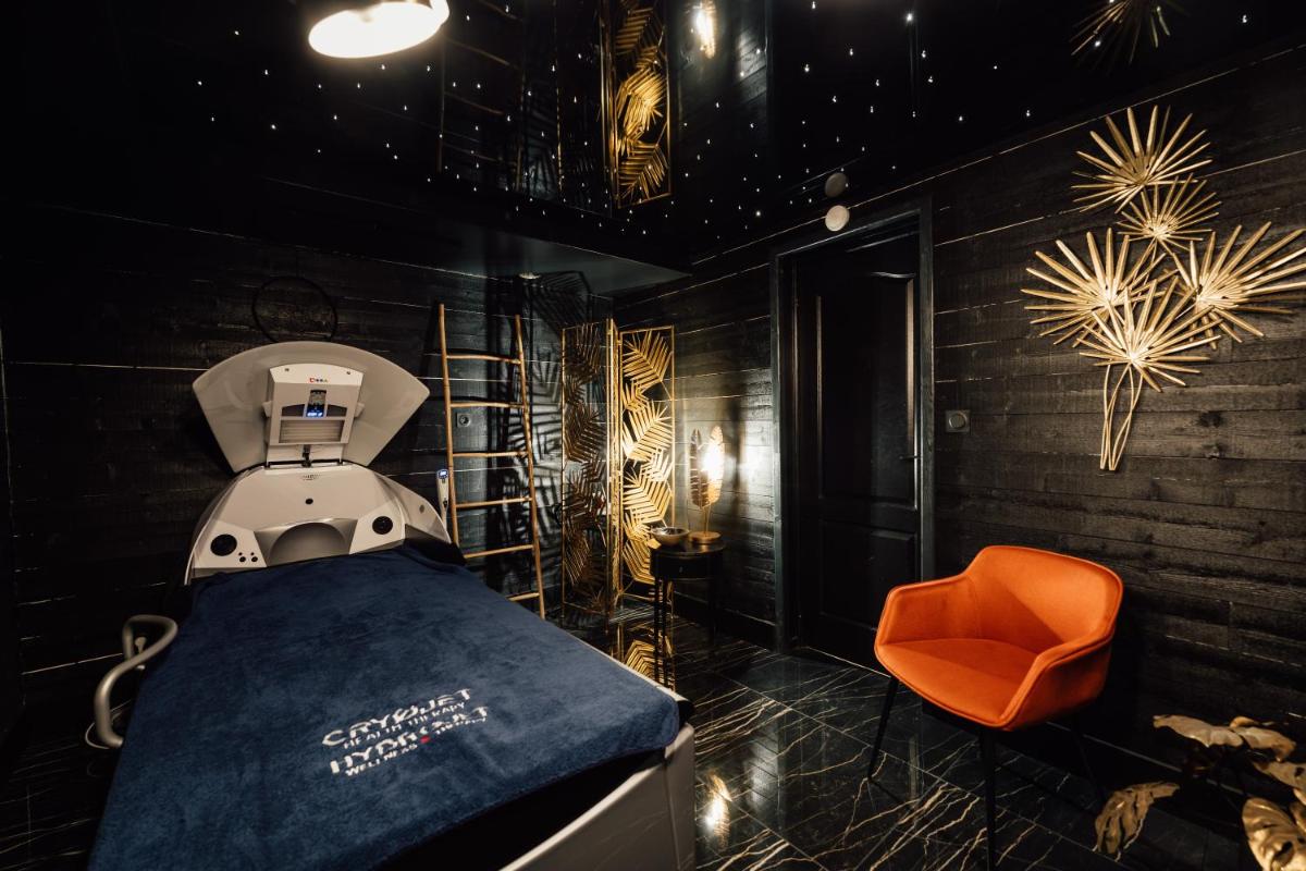 Coin salon dans l'établissement La villa 10 HÔTEL SPA