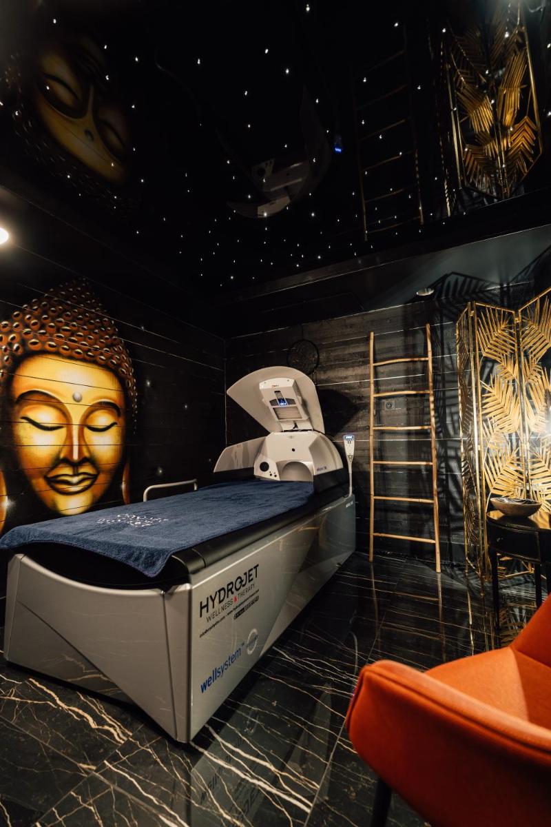 Un ou plusieurs lits dans un hébergement de l'établissement La villa 10 HÔTEL SPA