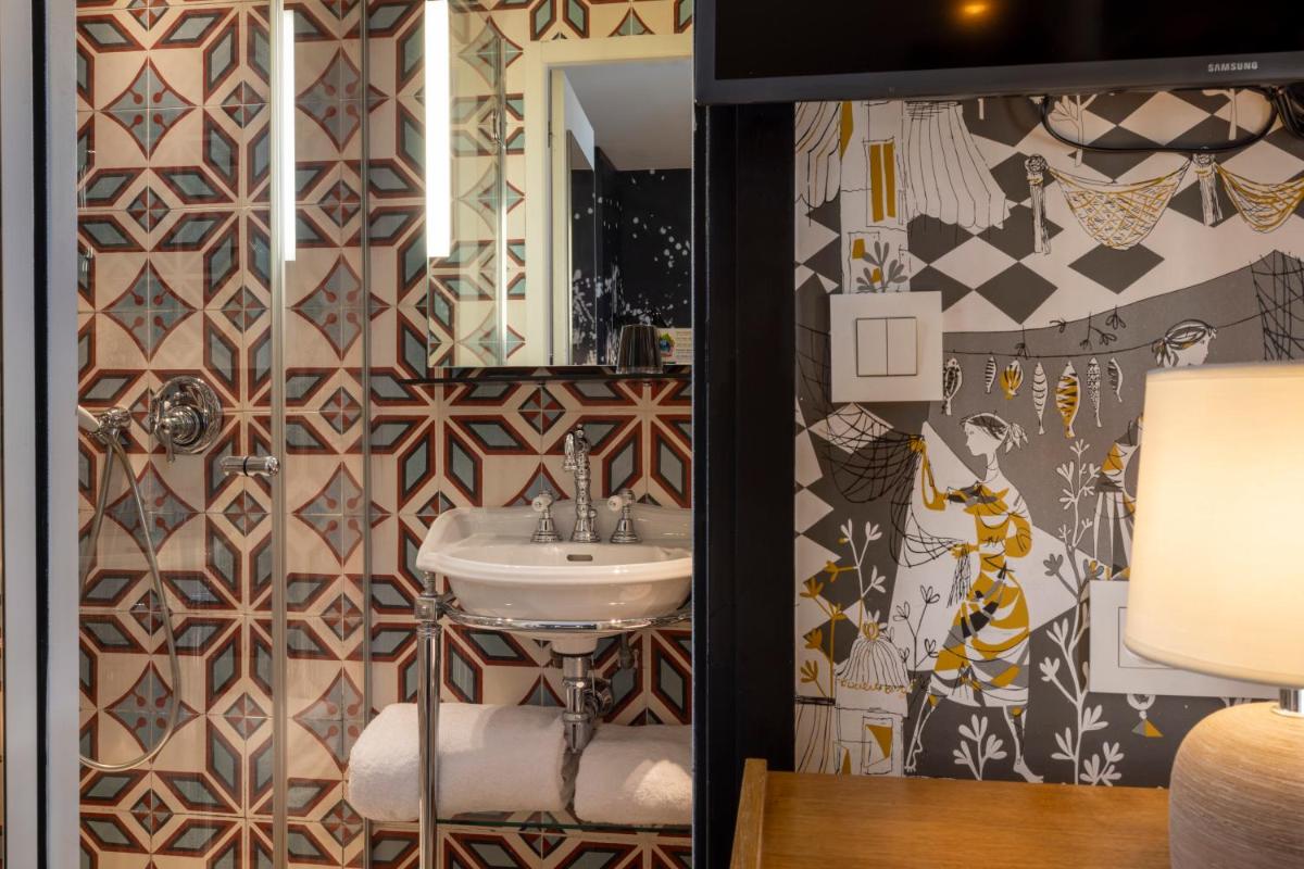 Salle de bains dans l'établissement Hotel L’Antoine