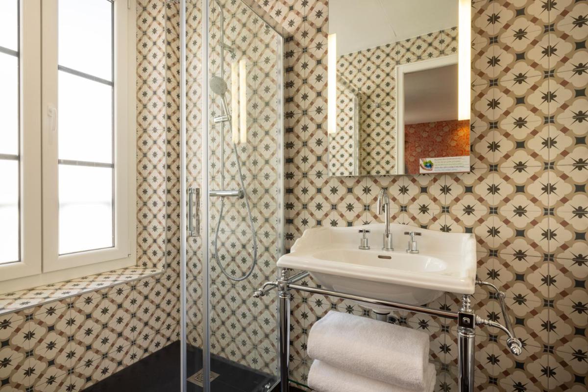 Salle de bains dans l'établissement Hotel L’Antoine