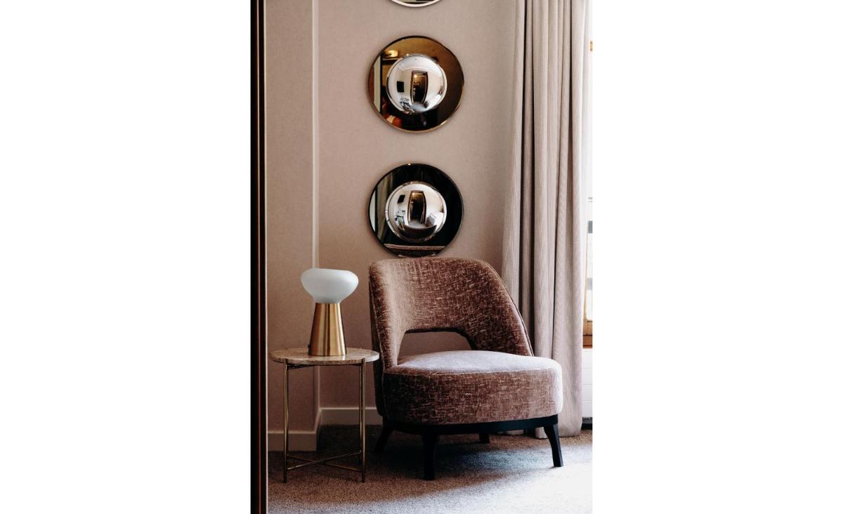 Coin salon dans l'établissement Hotel Le Cottage Bise