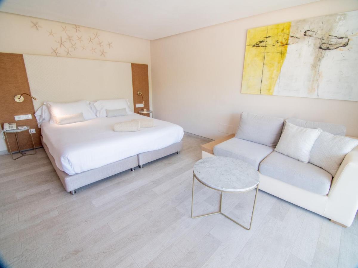 Cama o camas de una habitación en Melbeach Hotel & Spa - Adults Only