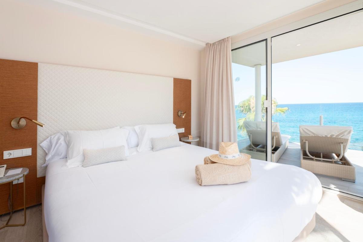 Cama o camas de una habitación en Melbeach Hotel & Spa - Adults Only