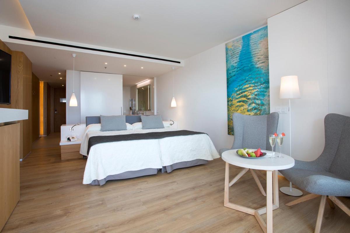 Cama o camas de una habitación en Hipotels Playa de Palma Palace&Spa
