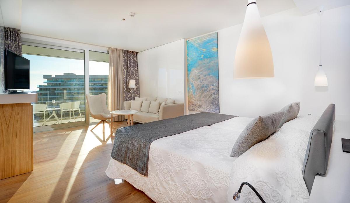 Cama o camas de una habitación en Hipotels Playa de Palma Palace&Spa