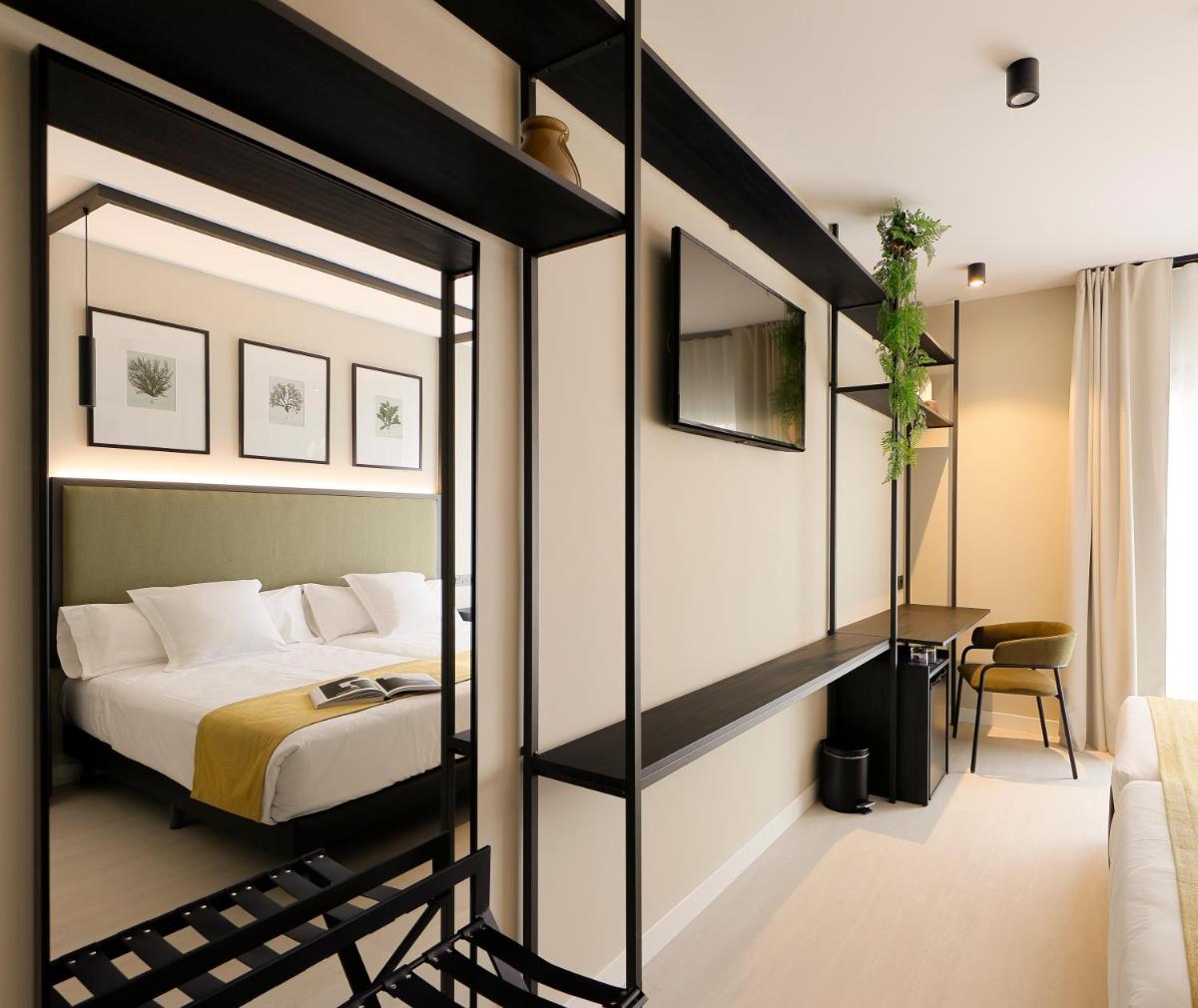 Cama o camas de una habitación en Nuvō Hotel Boutique