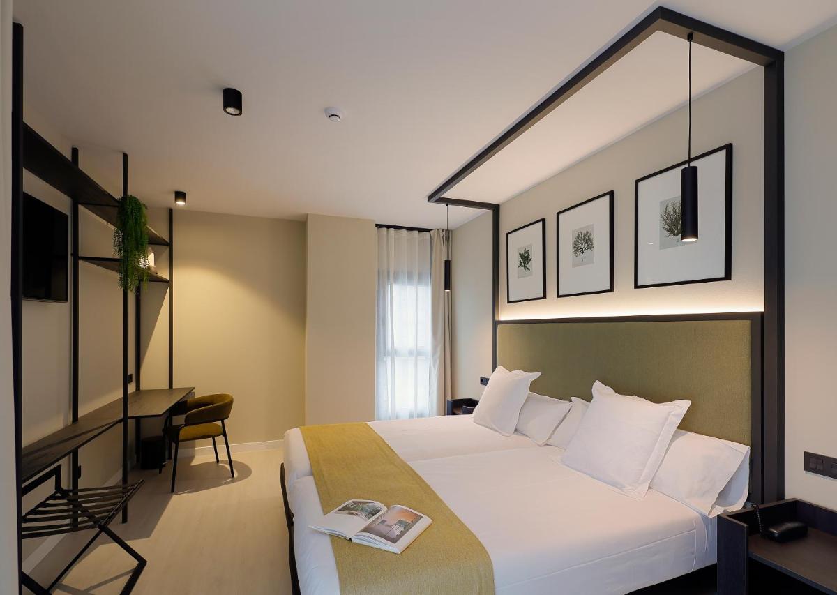 Cama o camas de una habitación en Nuvō Hotel Boutique