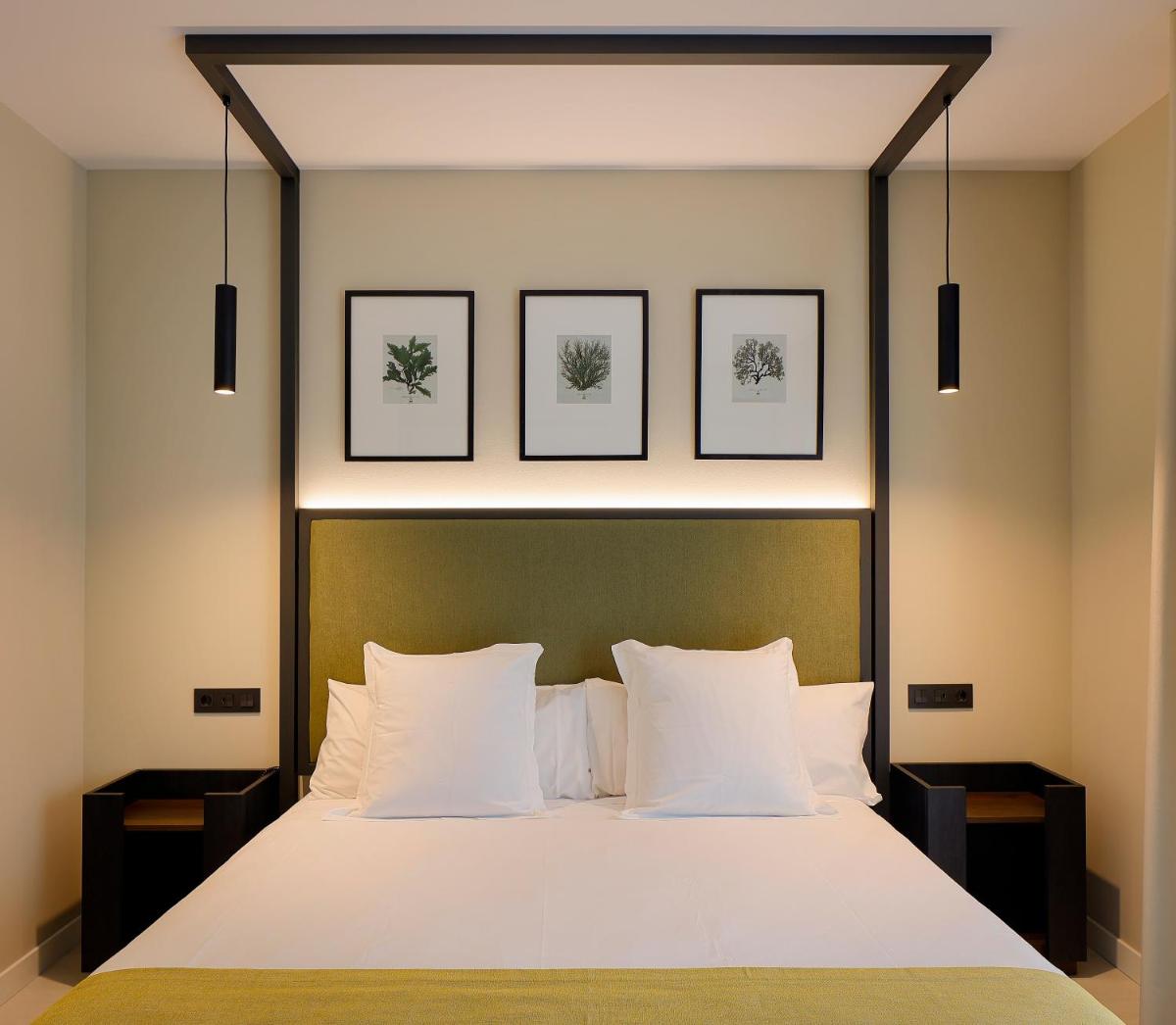 Cama o camas de una habitación en Nuvō Hotel Boutique