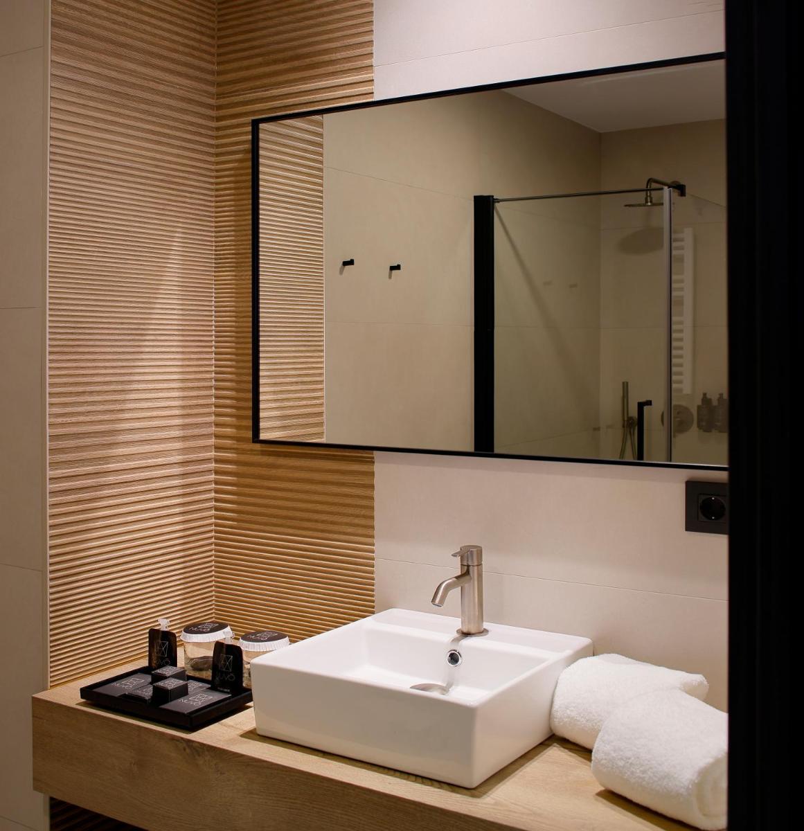 Un baño de Nuvō Hotel Boutique