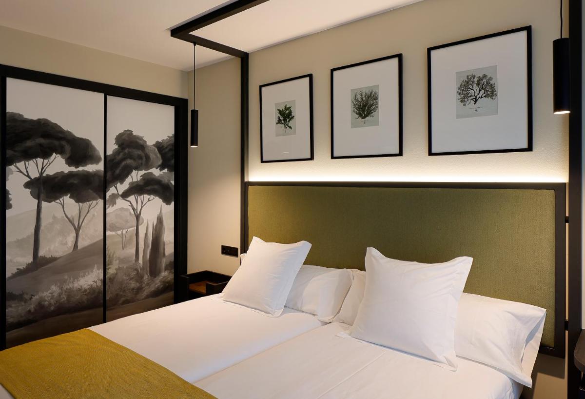 Cama o camas de una habitación en Nuvō Hotel Boutique