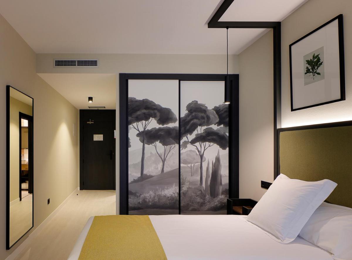 Cama o camas de una habitación en Nuvō Hotel Boutique