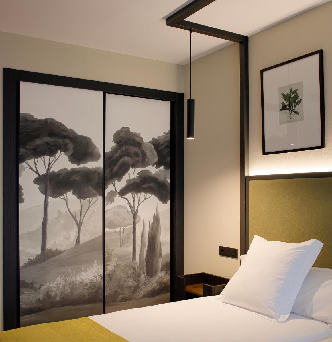 Cama o camas de una habitación en Nuvō Hotel Boutique