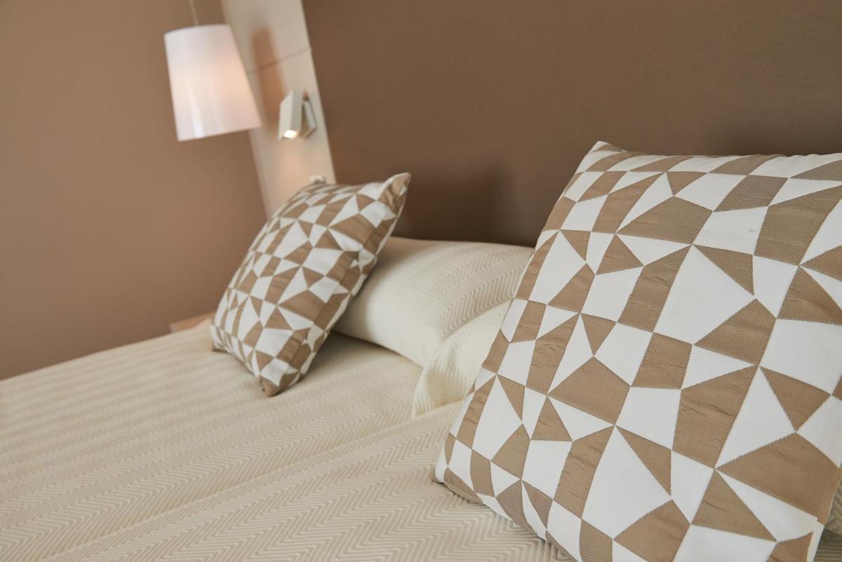 Cama o camas de una habitación en Hipotels Gran Playa de Palma