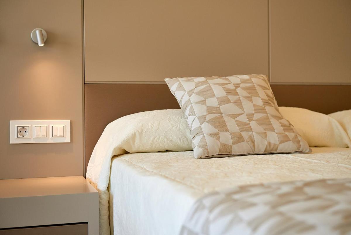 Cama o camas de una habitación en Hipotels Gran Playa de Palma