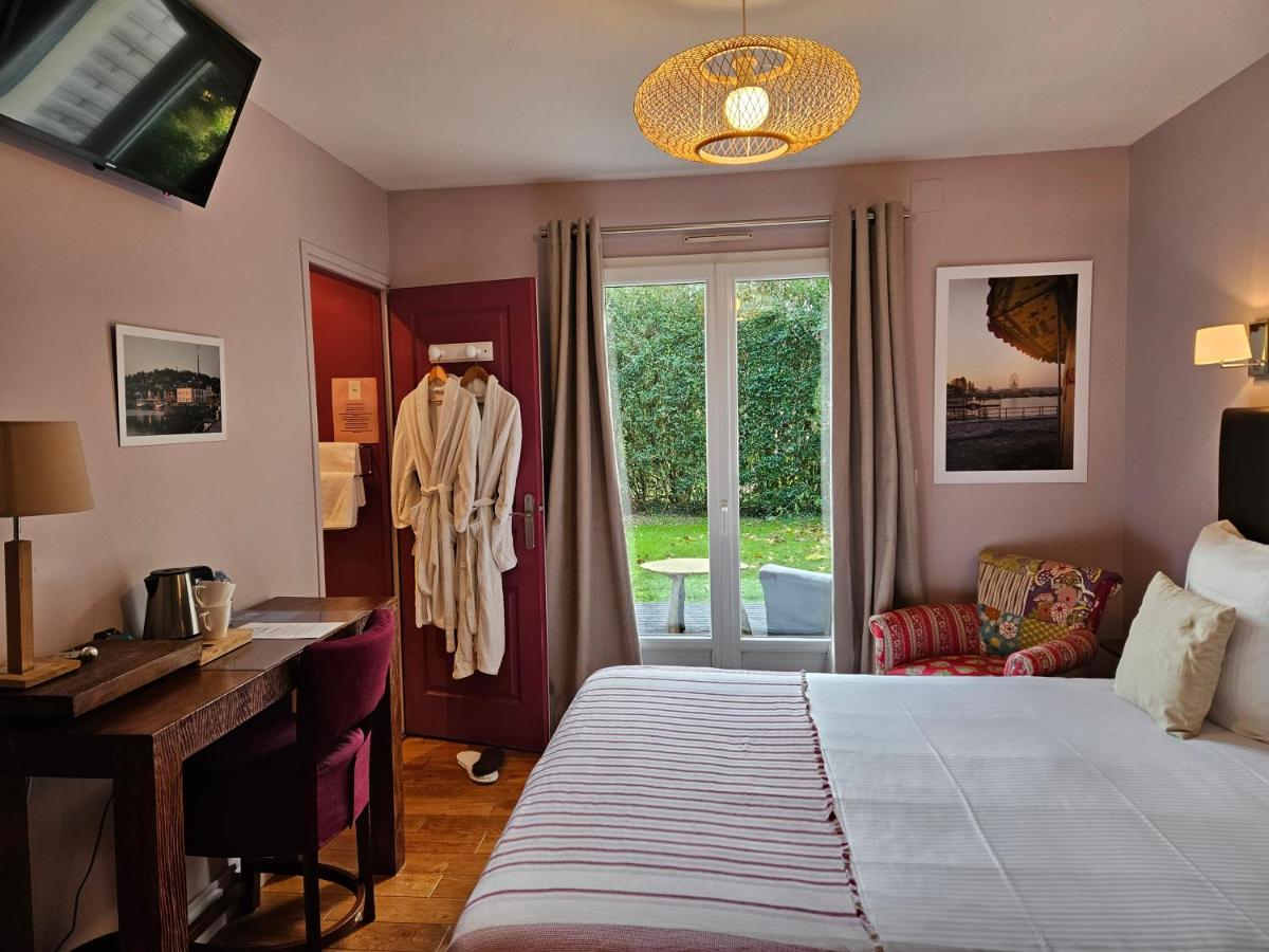 Un ou plusieurs lits dans un hébergement de l'établissement La Fraîchette-Hôtel & Spa