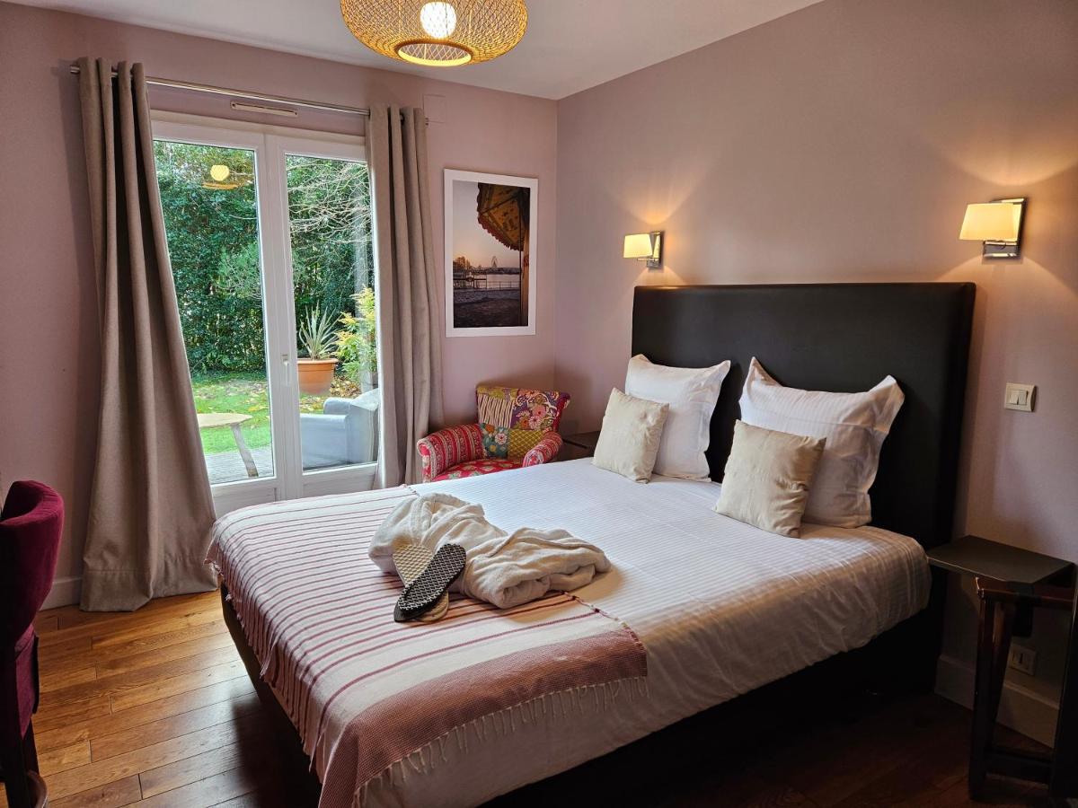 Un ou plusieurs lits dans un hébergement de l'établissement La Fraîchette-Hôtel & Spa