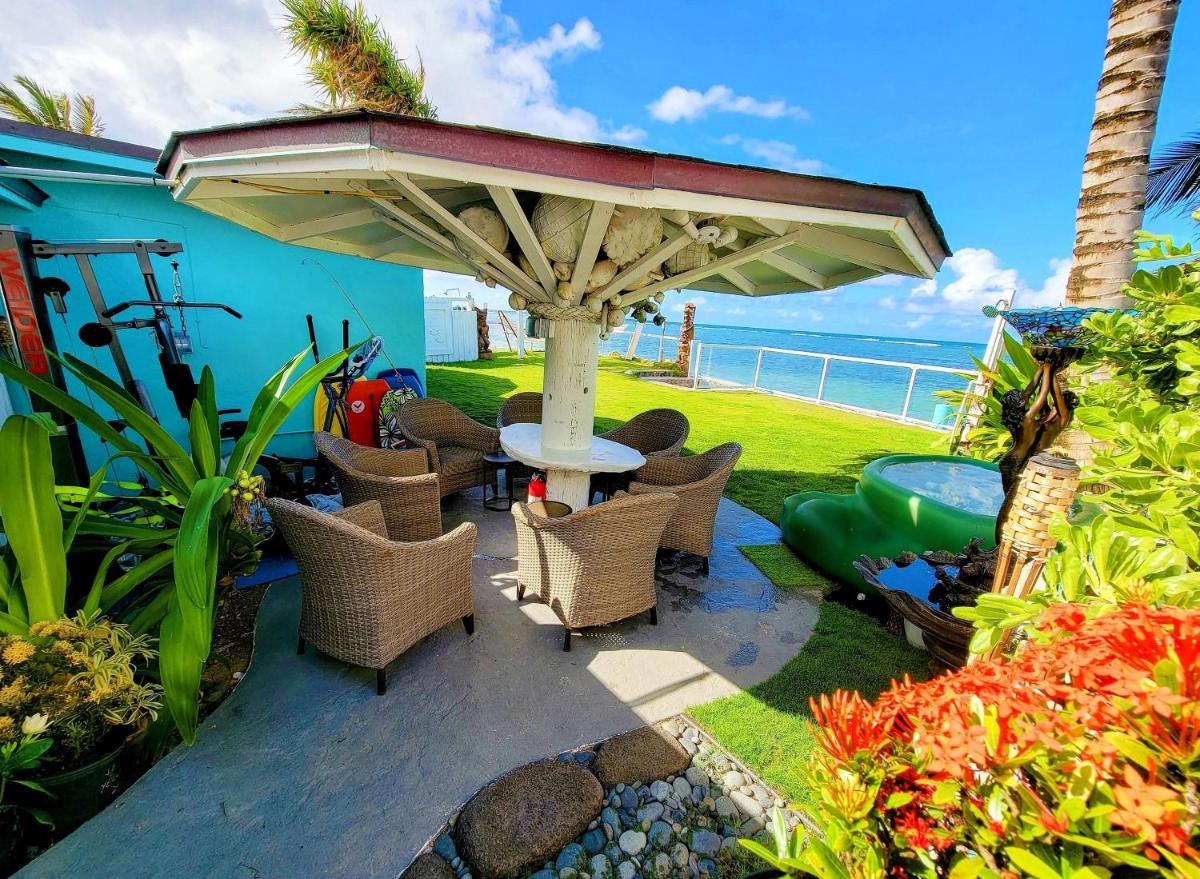 Corner Luxury Ethereal Hawaii Beachfront Estate for Monthly Rental with Private Beach & 3 Beachfront Jacuzzis & Snorkeling Reef & Jurassic Park Film Site - Housity
