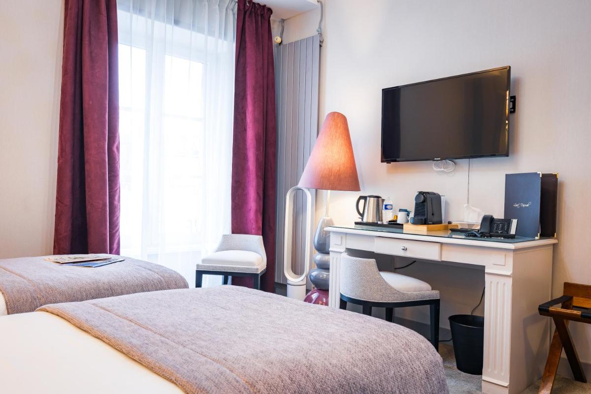 Un ou plusieurs lits dans un hébergement de l'établissement Grand Hôtel du Luxembourg & Spa