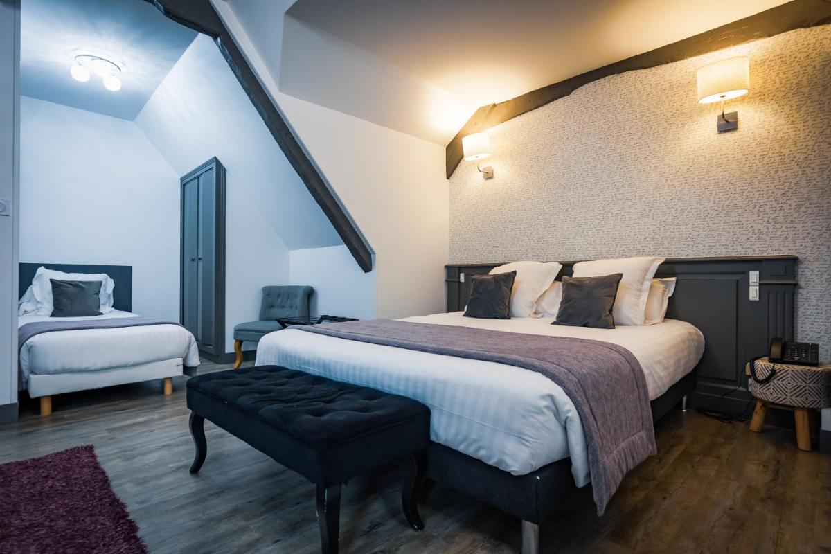Un ou plusieurs lits dans un hébergement de l'établissement Grand Hôtel du Luxembourg & Spa