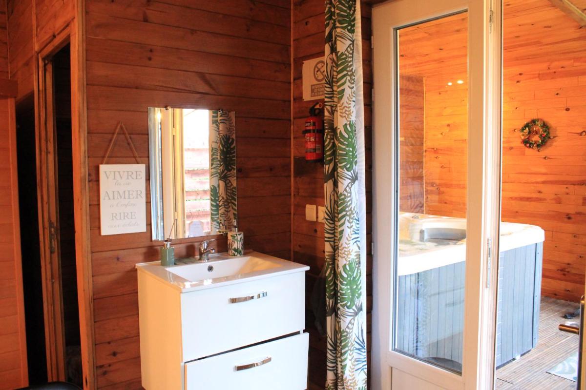 Au coucher du soleil, chalet avec jacuzzi et sauna - Housity