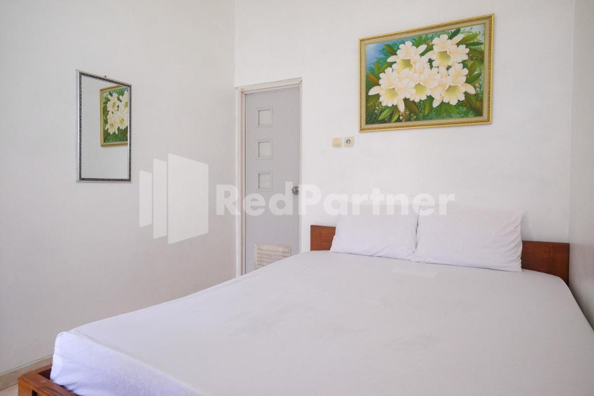 Wisma Giri Mulyo B near Grojogan Sewu Mitra RedDoorz - Housity