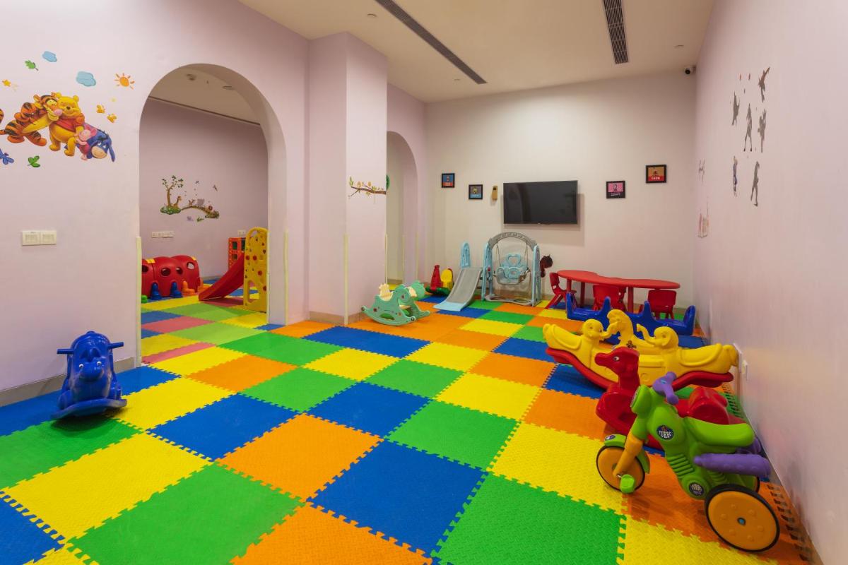 a childrens room with a colorful floor at DoubleTree By Hilton Jaipur Amer in Jaipur