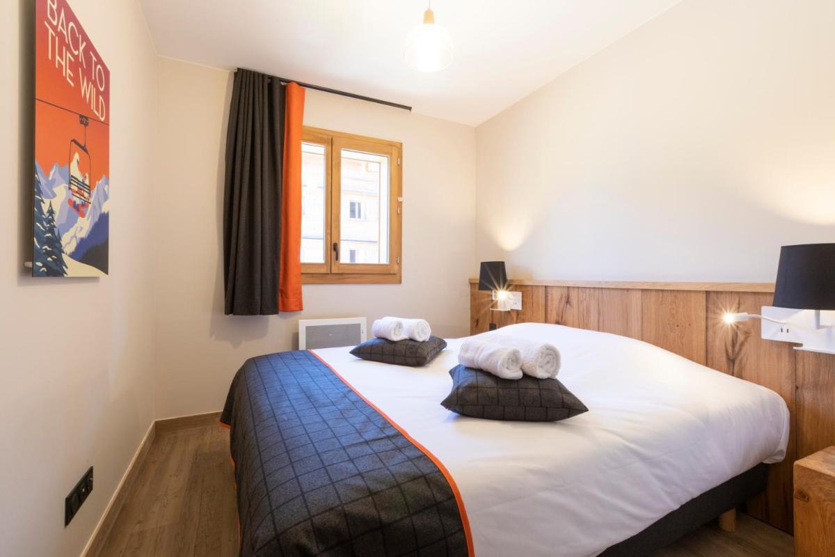 Un ou plusieurs lits dans un hébergement de l'établissement Résidence Club MMV Samoens