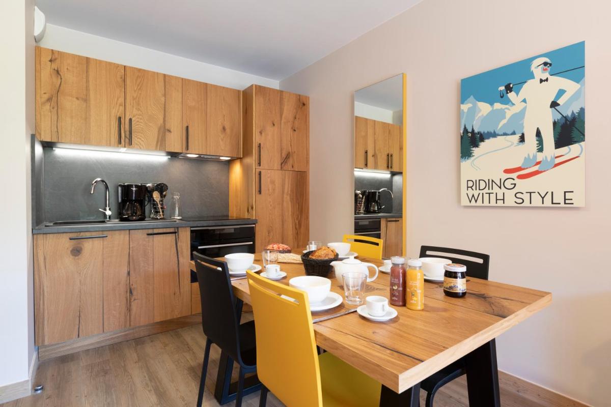 Cuisine ou kitchenette dans l'établissement Résidence Club MMV Samoens